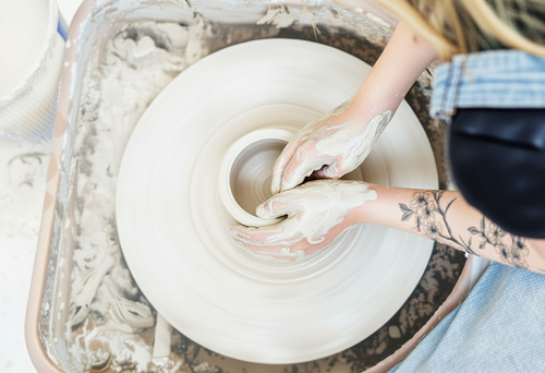 Hand throwing on the wheel